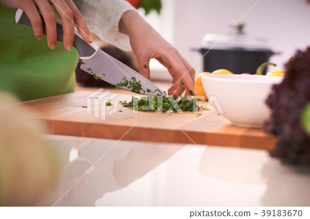 Close Up of human hands cooking vegetable salad in Close Up of human hands cooking vegetable salad in 39183670