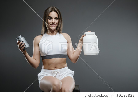 girl with supplement whey protein shake powder 39183825