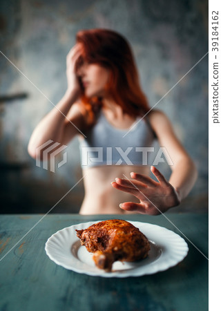 Skinny woman refuses to eat, anorexia 39184162