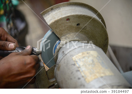 The machine operator  39184497