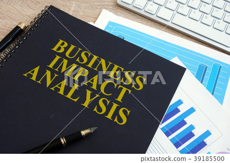 Business impact analysis (BIA) on a office desk. Business impact analysis (BIA) on a office desk. 39185500