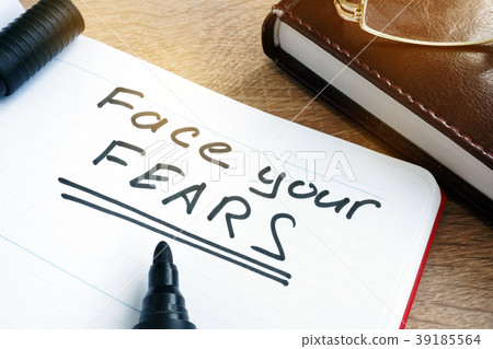 Face your fears written in a note. 39185564