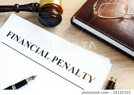 Document with title Financial penalty on a desk. 39185565