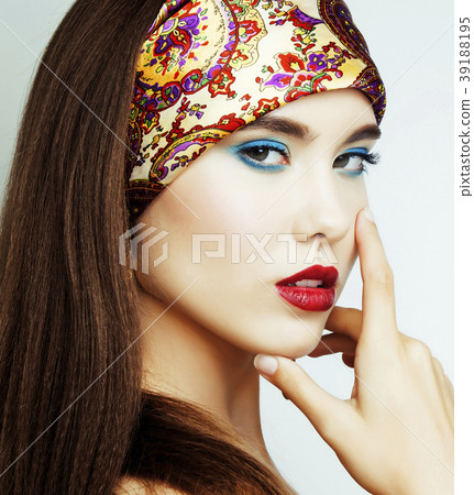 young pretty modern girl with bright shawl on head 39188195