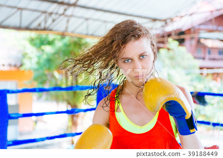 female boxer inside thai boxing ring. angree female boxer inside thai boxing ring. angree 39188449