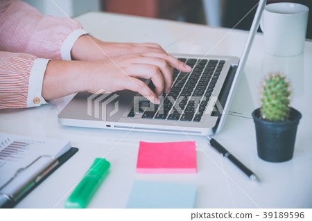 Business woman working Laptop 39189596