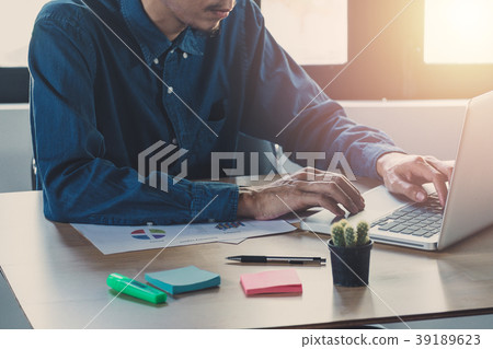 Businessman hand working with finances about cost Businessman hand working with finances about cost 39189623