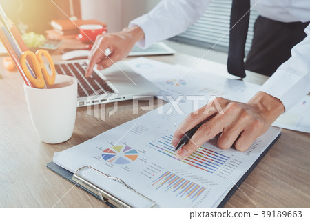 Businessman hand working with finances about cost Businessman hand working with finances about cost 39189663