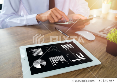 Businessman hand working with financial data 39189767