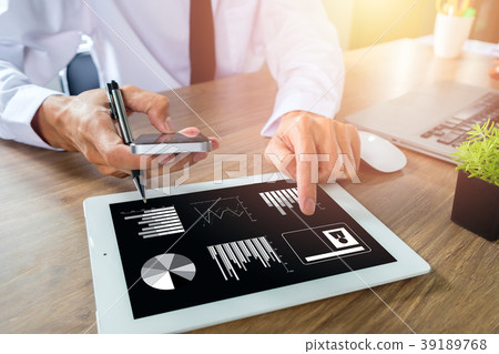 Businessman working with smart phone Businessman working with smart phone 39189768