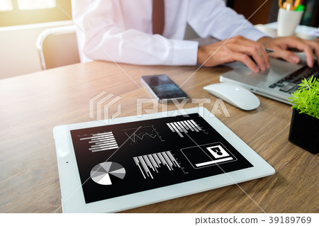 Businessman hand working with financial data Businessman hand working with financial data 39189769