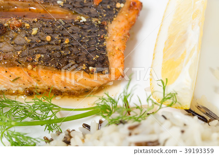 Griiled salmon fillet with basmati rice. 39193359