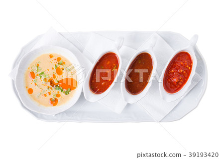 Chicken fillets and various sauces from tomato. 39193420