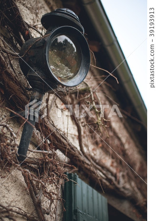 Old wall lantern in a rustic style  39193913