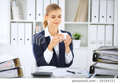 Happy business woman or female accountant having Happy business woman or female accountant having 39194151