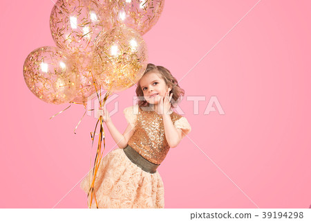 Cheerful festive girl with bunch of balloons Cheerful festive girl with bunch of balloons 39194298