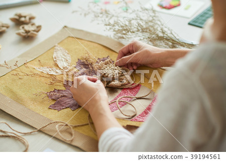 Giving Final Touches on Artwork Giving Final Touches on Artwork 39194561