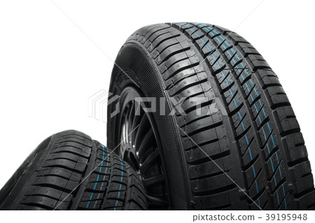 New and unused car tires against isolated 39195948