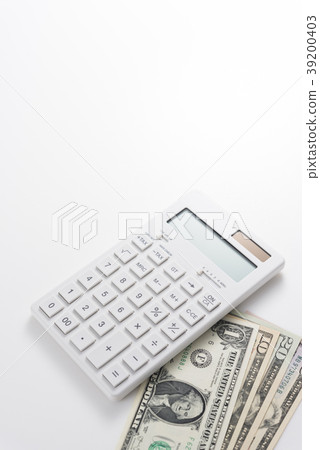Dollar bills and calculator Dollar bills and calculator 39200403