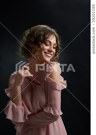 Frontview of curly girl, who is smiling and Frontview of curly girl, who is smiling and 39201189
