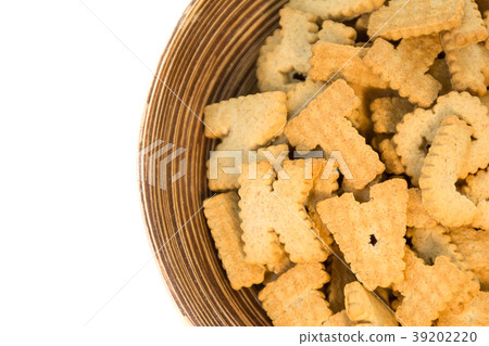 alphabet shaped biscuits in wood plate alphabet shaped biscuits in wood plate 39202220