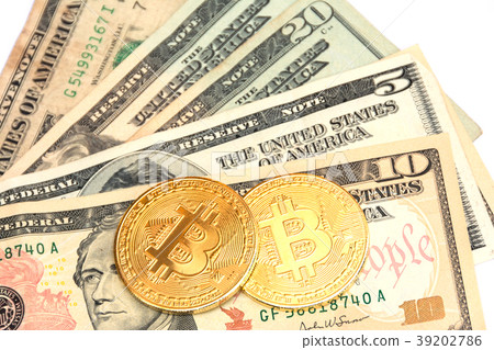 symbolic coins of bitcoin on banknotes symbolic coins of bitcoin on banknotes 39202786