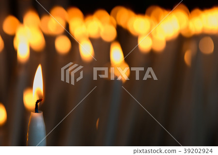Candles in a church in Lourdes 39202924