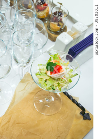Salad with shrimp, red caviar, vegetables and 39203011
