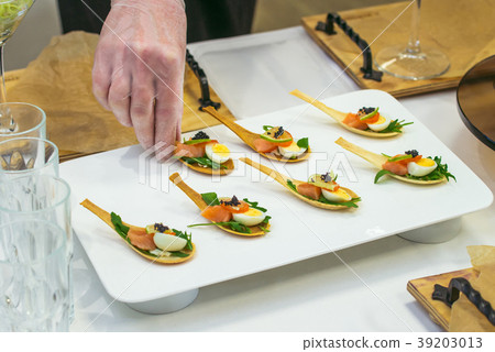 Delicates, appetizer filling with red fish, quail 39203013