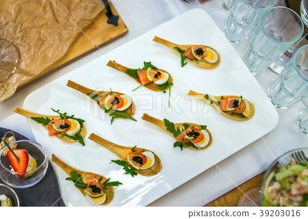 Delicates, appetizer filling with red fish, quail 39203016