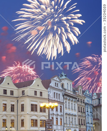 Old town houses and holiday fireworks in Prague 39204089
