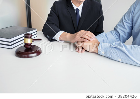 Image of Male lawyer or judge help encourage client, customer, w 39204420
