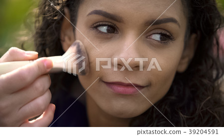 Pretty face of beautiful smiling female actress 39204591