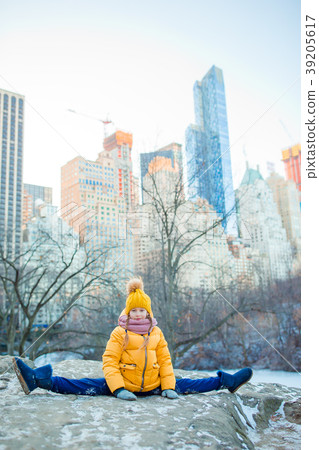 Adorable little girl with view of ice-rink in Adorable little girl with view of ice-rink in 39205617