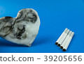 heart is black and light colors on blue background 39205656