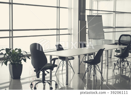 Workplace with furniture in business center 39206111