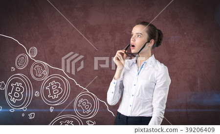 Woman standing near btc logo. Concept of virtual 39206409