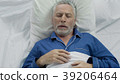 Aged male loudly snoring and puffing in bed 39206464