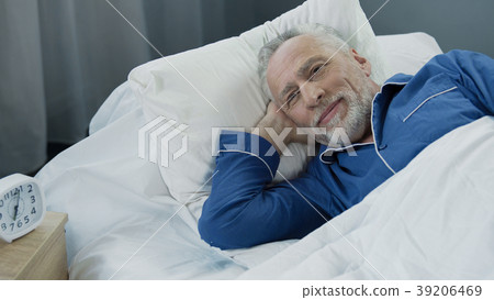 Retired man waking up active and full of energy Retired man waking up active and full of energy 39206469