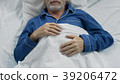 Male pensioner sweetly sleeping in bed, enjoying 39206472
