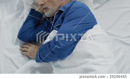 Elder lying in bed, unable to calm down and fall Elder lying in bed, unable to calm down and fall 39206485