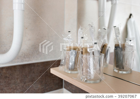 Close up view on the bottles with cosmetics and Close up view on the bottles with cosmetics and 39207067