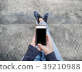 a lady using smartphone for online shopping 39210988