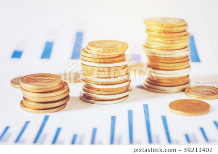Graph on rows of coins for finance and banking Graph on rows of coins for finance and banking 39211402
