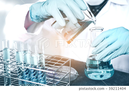 Scientist with equipment holding tools during Scientist with equipment holding tools during 39211404