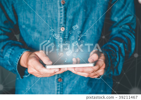 Businessman using mobile online text messaging 39211467