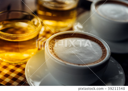 Coffee in cup on table with tea at coffee shop Coffee in cup on table with tea at coffee shop 39211548