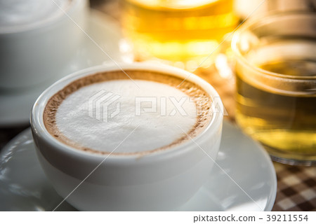 Coffee in cup on table with tea at coffee shop Coffee in cup on table with tea at coffee shop 39211554