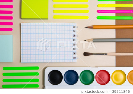 Stationery with a notebook. 39211846
