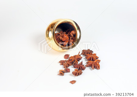 Star anise spice in shiny metal pot 39213704